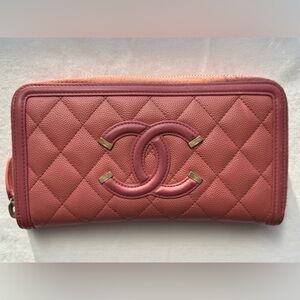 CHANEL Quilted Pink Leather Ziparound Wallet